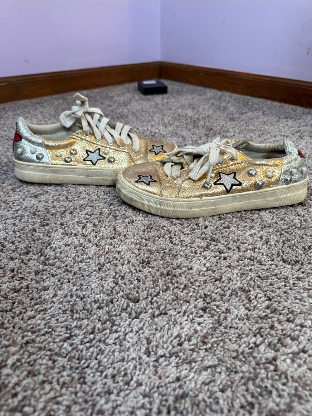 Gold and silver sneakers